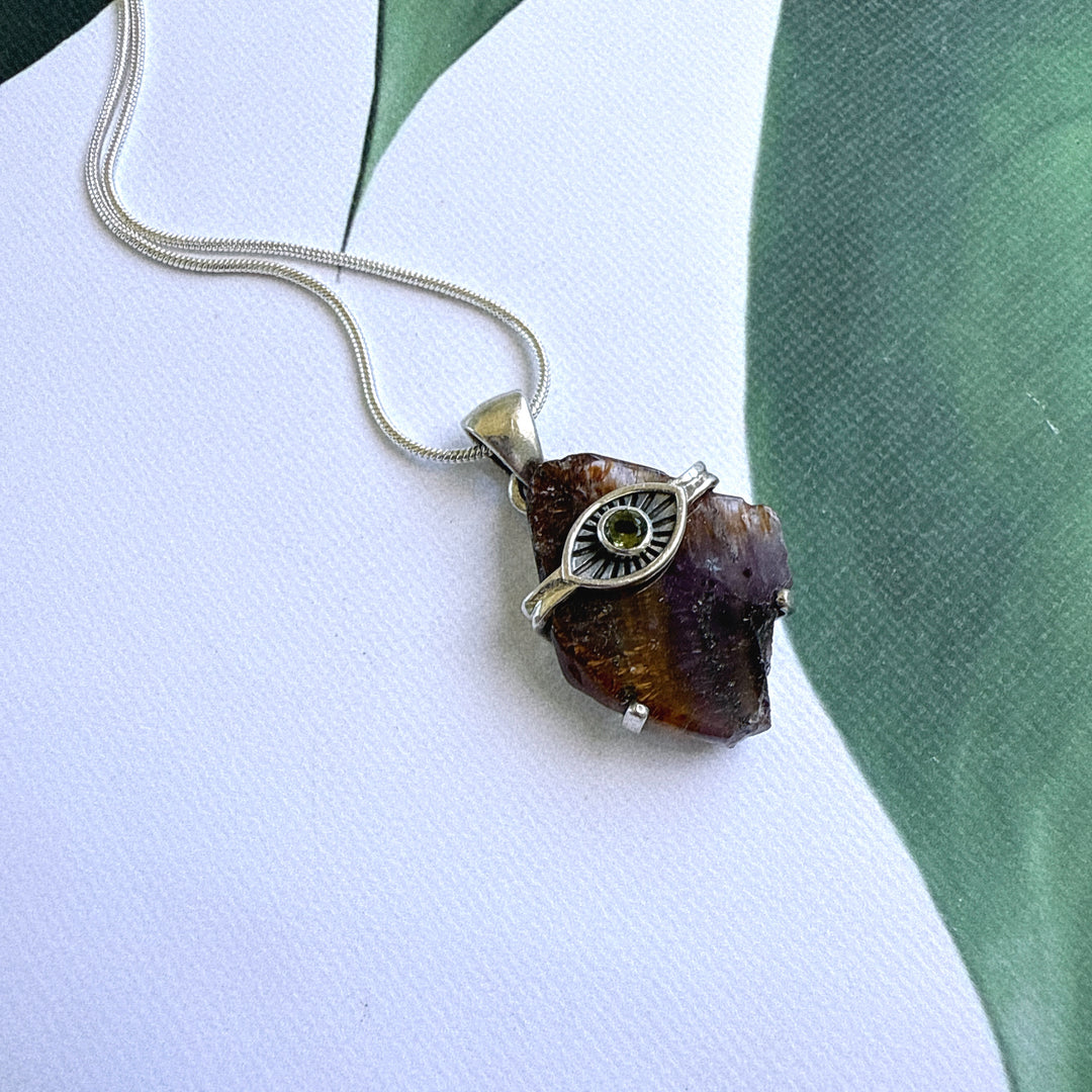 Evil Eye Pendant with Moldavite & Caxonete