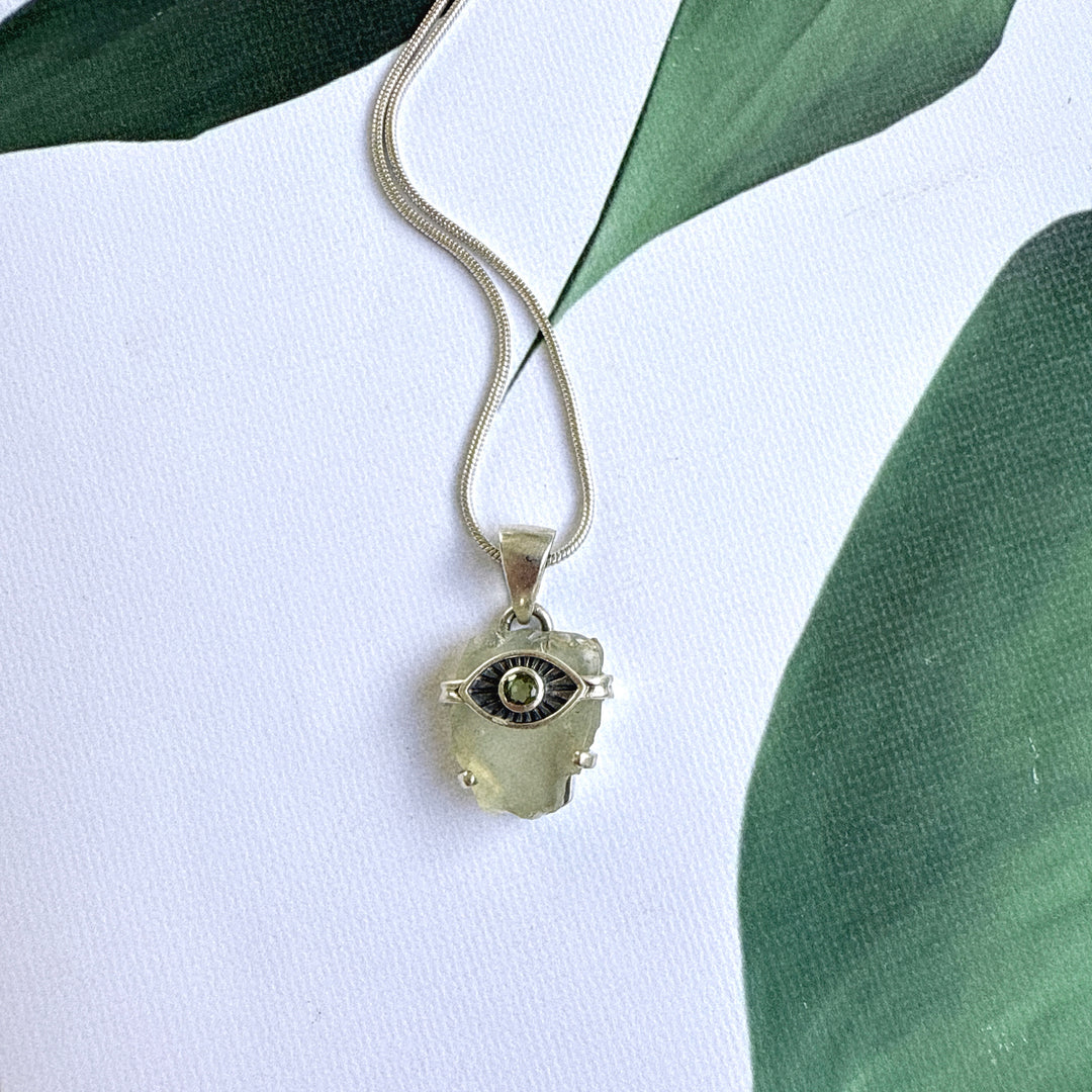 Faceted Moldavite and Libyan Desert Evil Eye Pendant