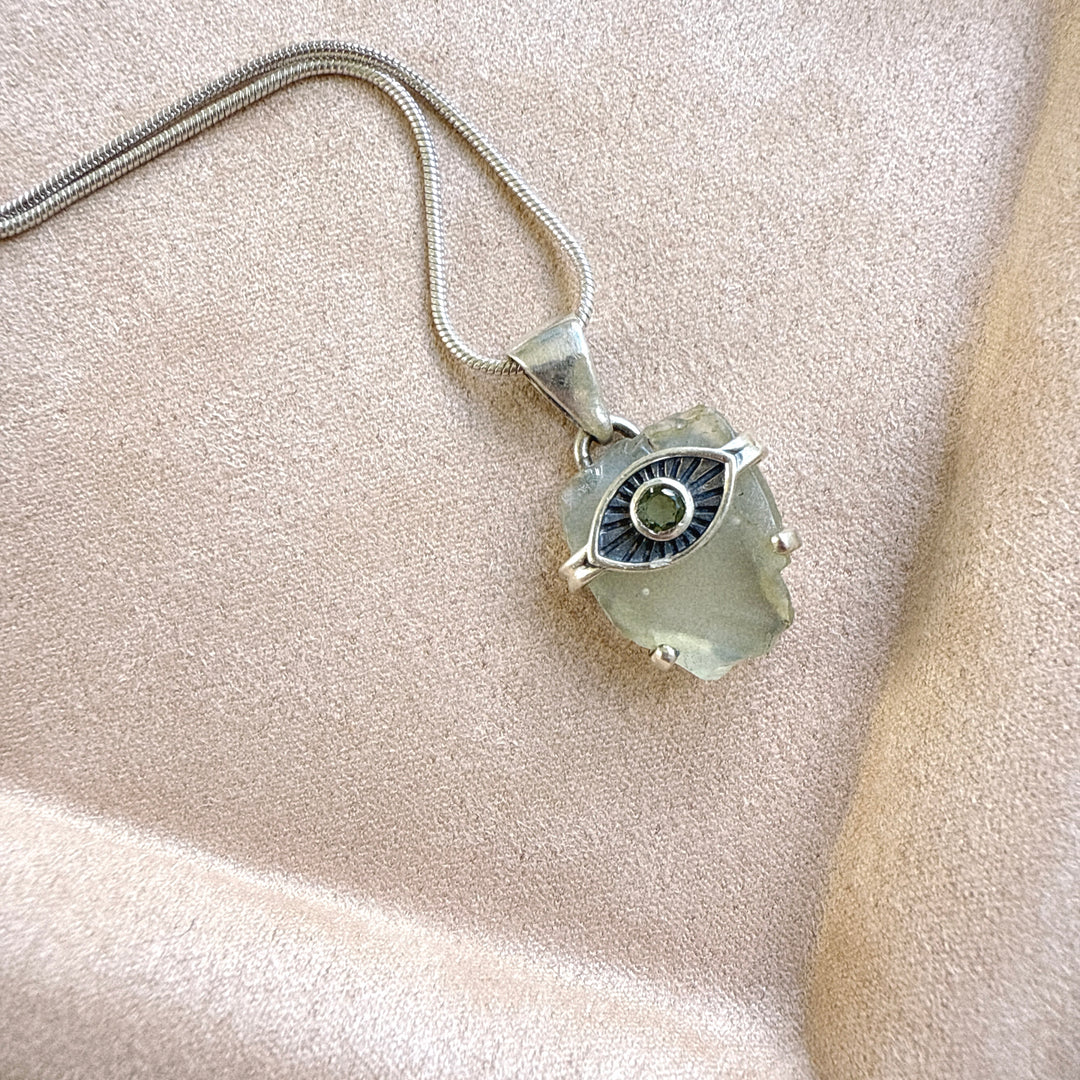 Faceted Moldavite and Libyan Desert Evil Eye Pendant