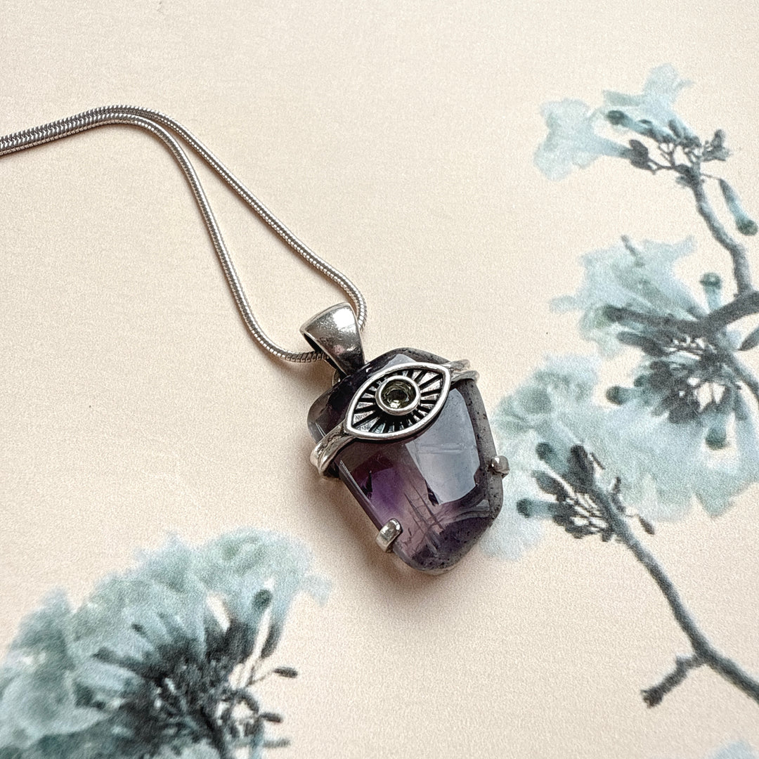 Evil Eye Pendant with Moldavite & Caxonete