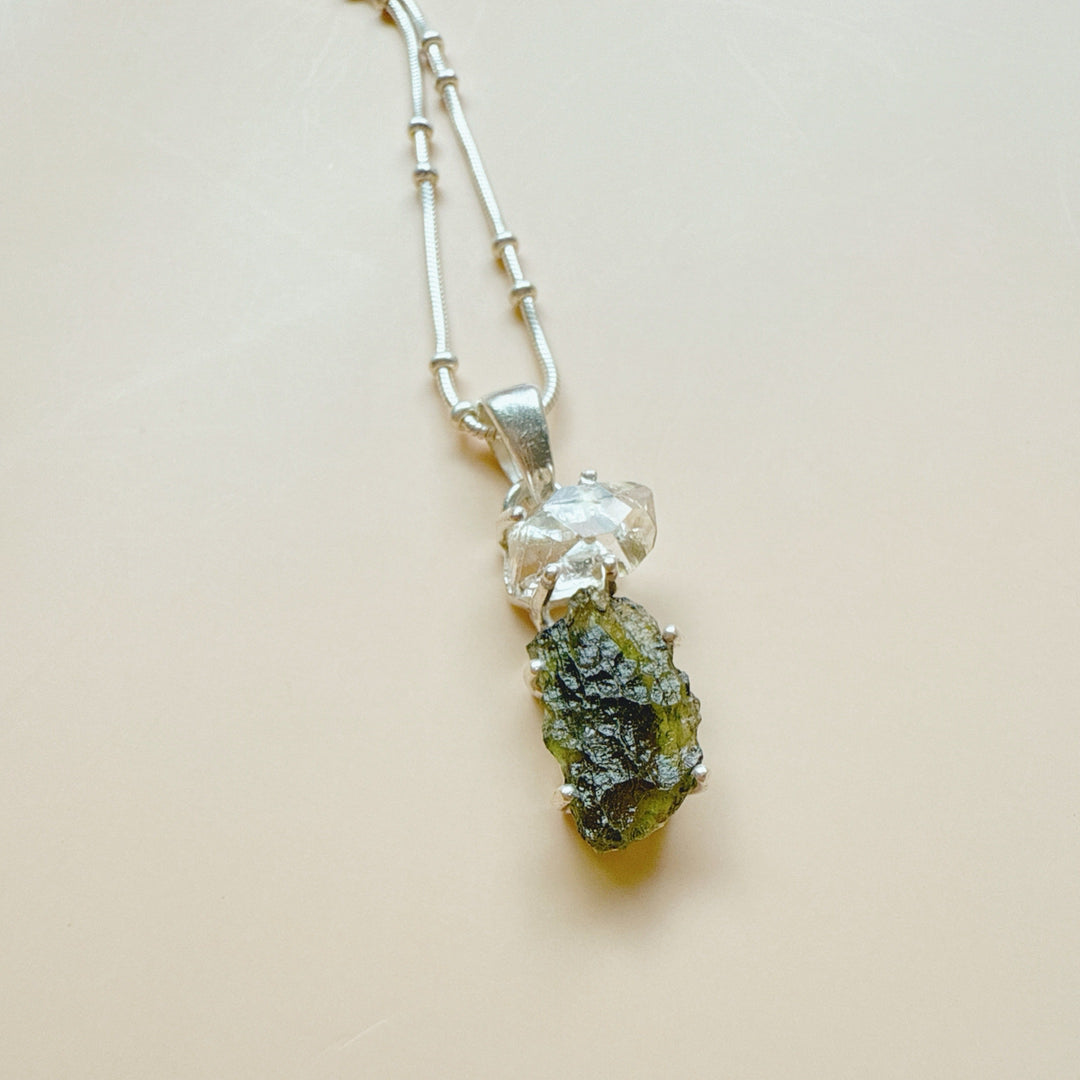 MOLDAVITE & HERKEMIER DIAMOND PENDANT