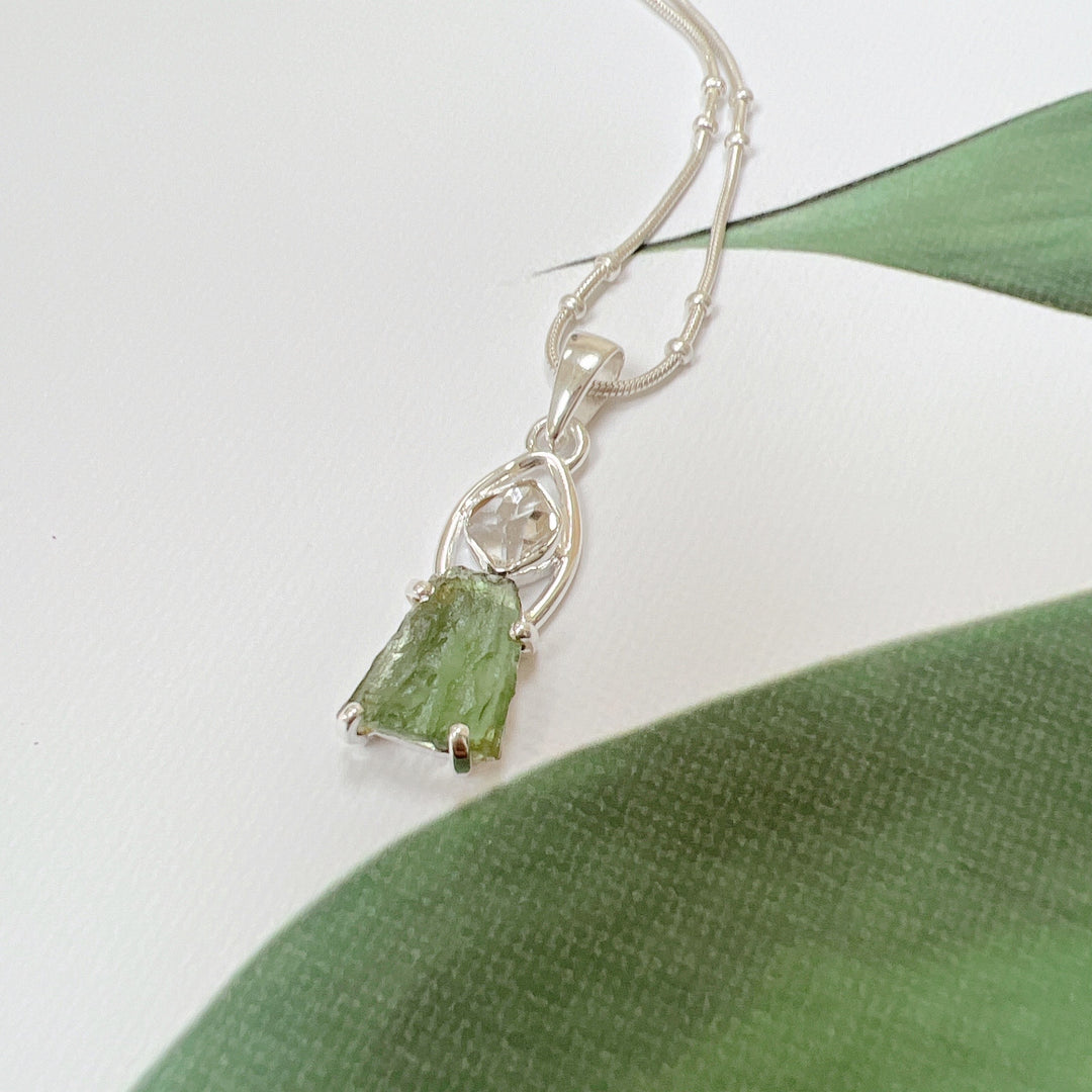 MOLDAVITE & HERKEMIER DIAMOND PENDANT