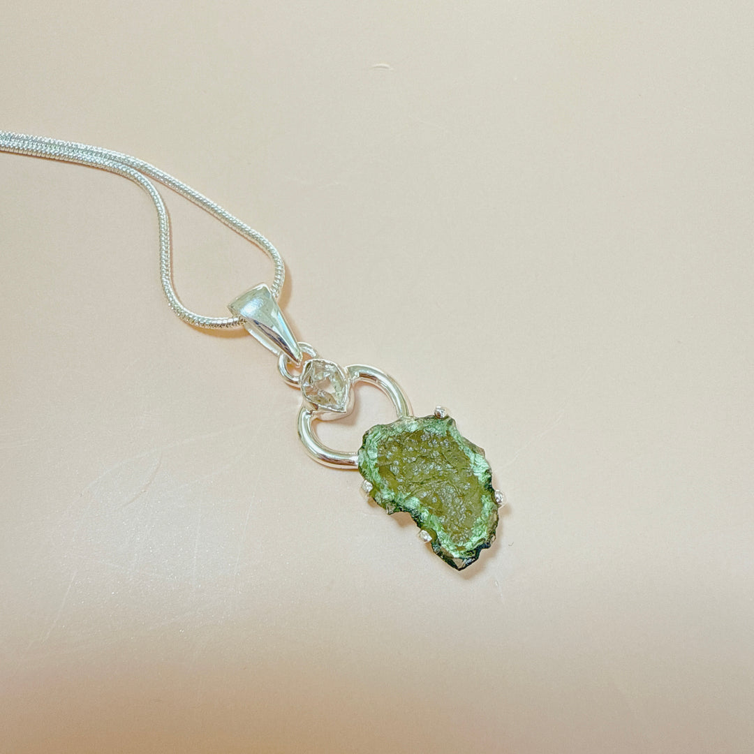 MOLDAVITE & HERKEMIER DIAMOND PENDANT