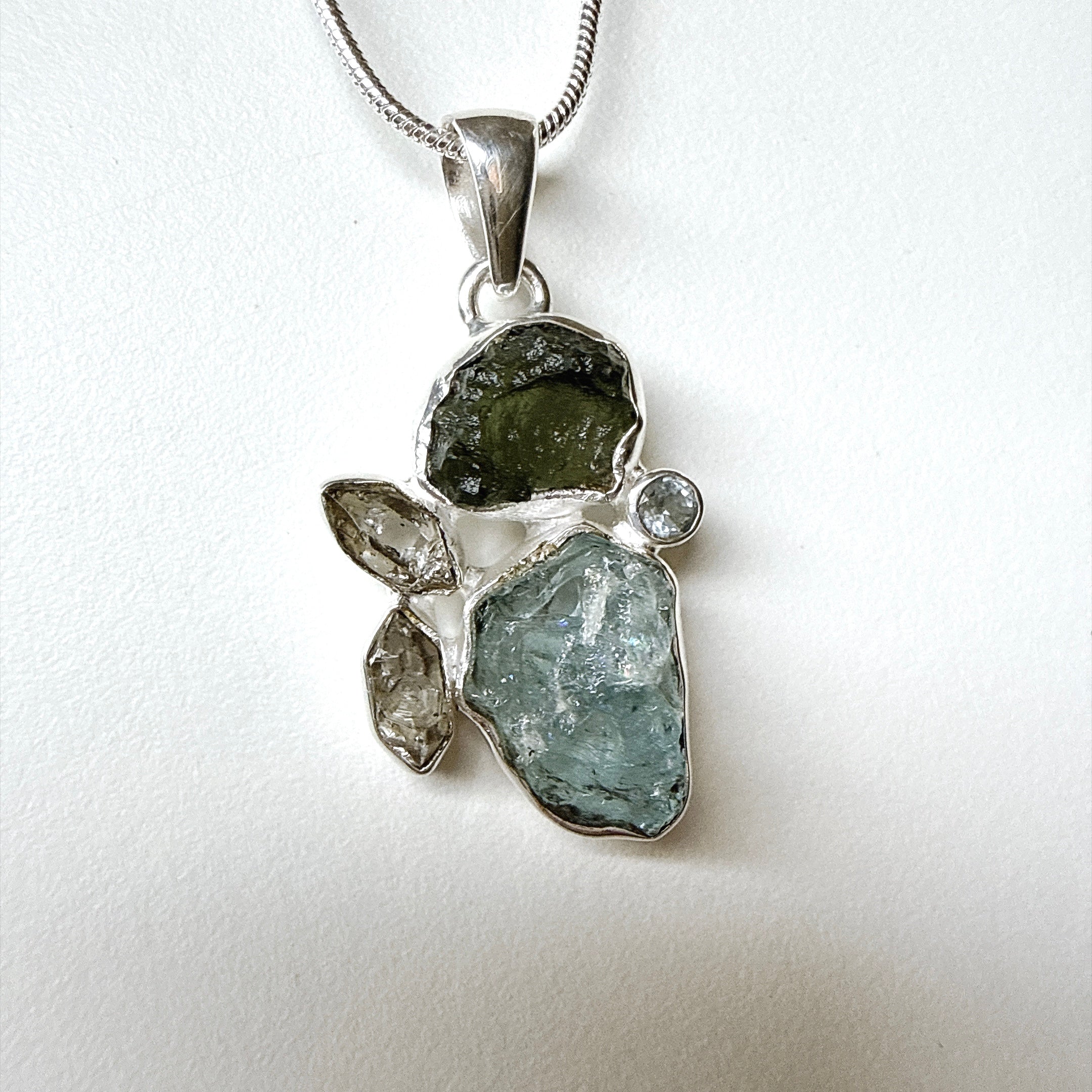 Moldavite, Aquamarine Rough, Herkimer Diamond & Blue Topaz Pendant