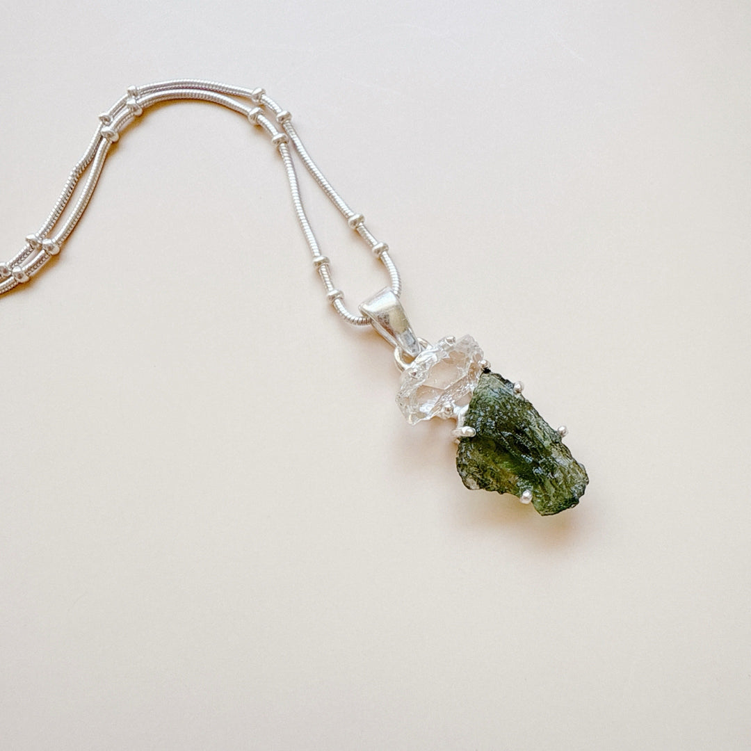 MOLDAVITE & HERKEMIER DIAMOND PENDANT