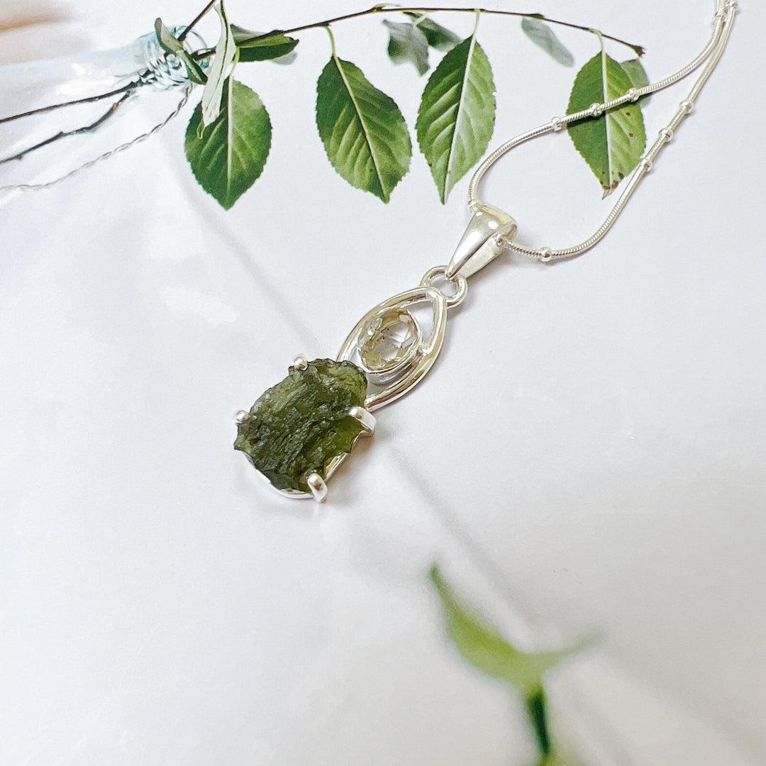 MOLDAVITE & HERKEMIER DIAMOND PENDANT