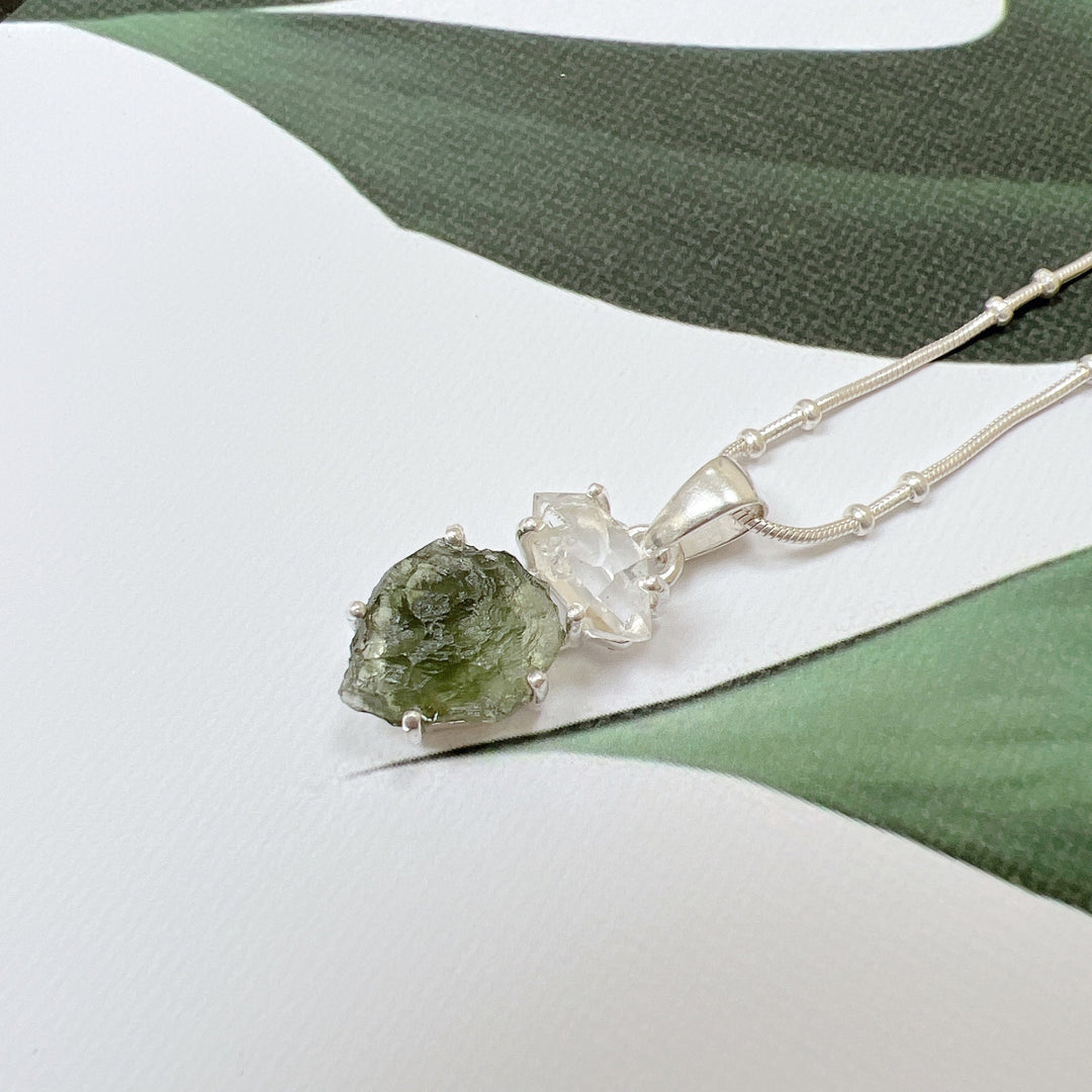 MOLDAVITE & HERKEMIER DIAMOND PENDANT