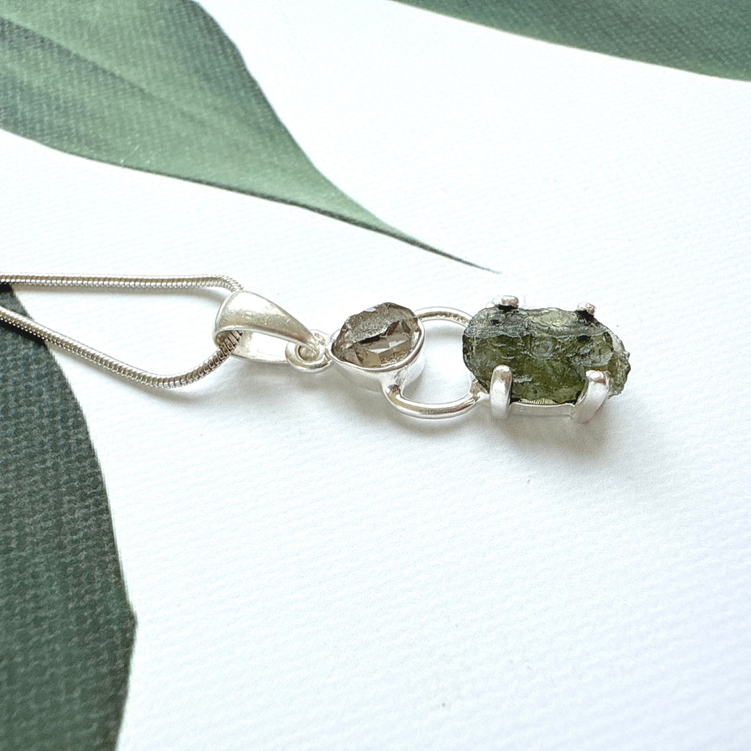 MOLDAVITE & HERKEMIER DIAMOND PENDANT