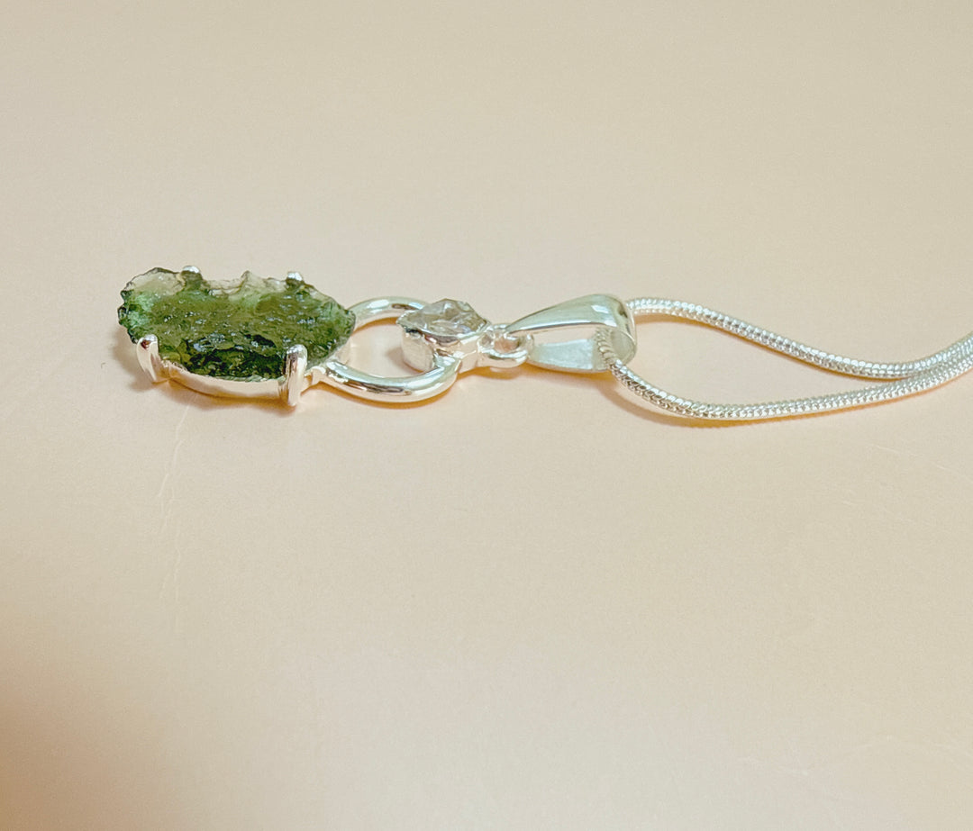 MOLDAVITE & HERKEMIER DIAMOND PENDANT