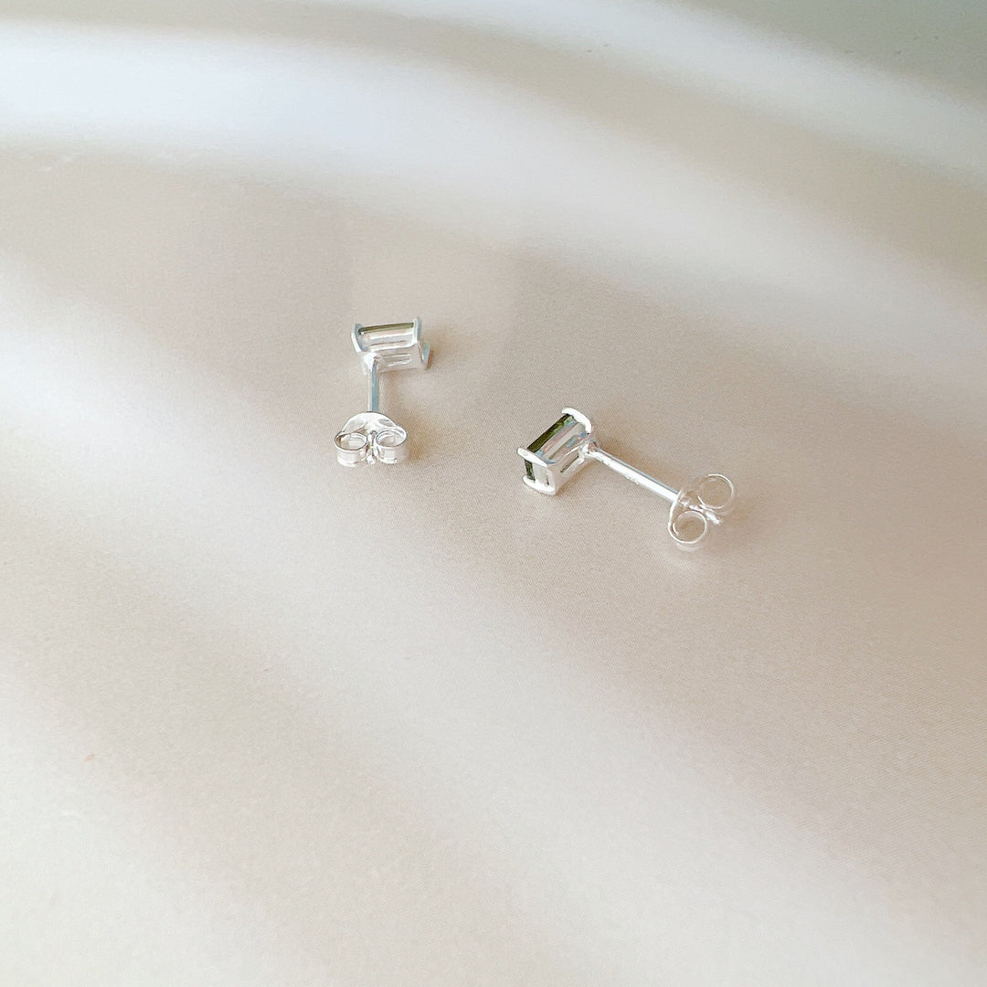 moldavite studs faceted